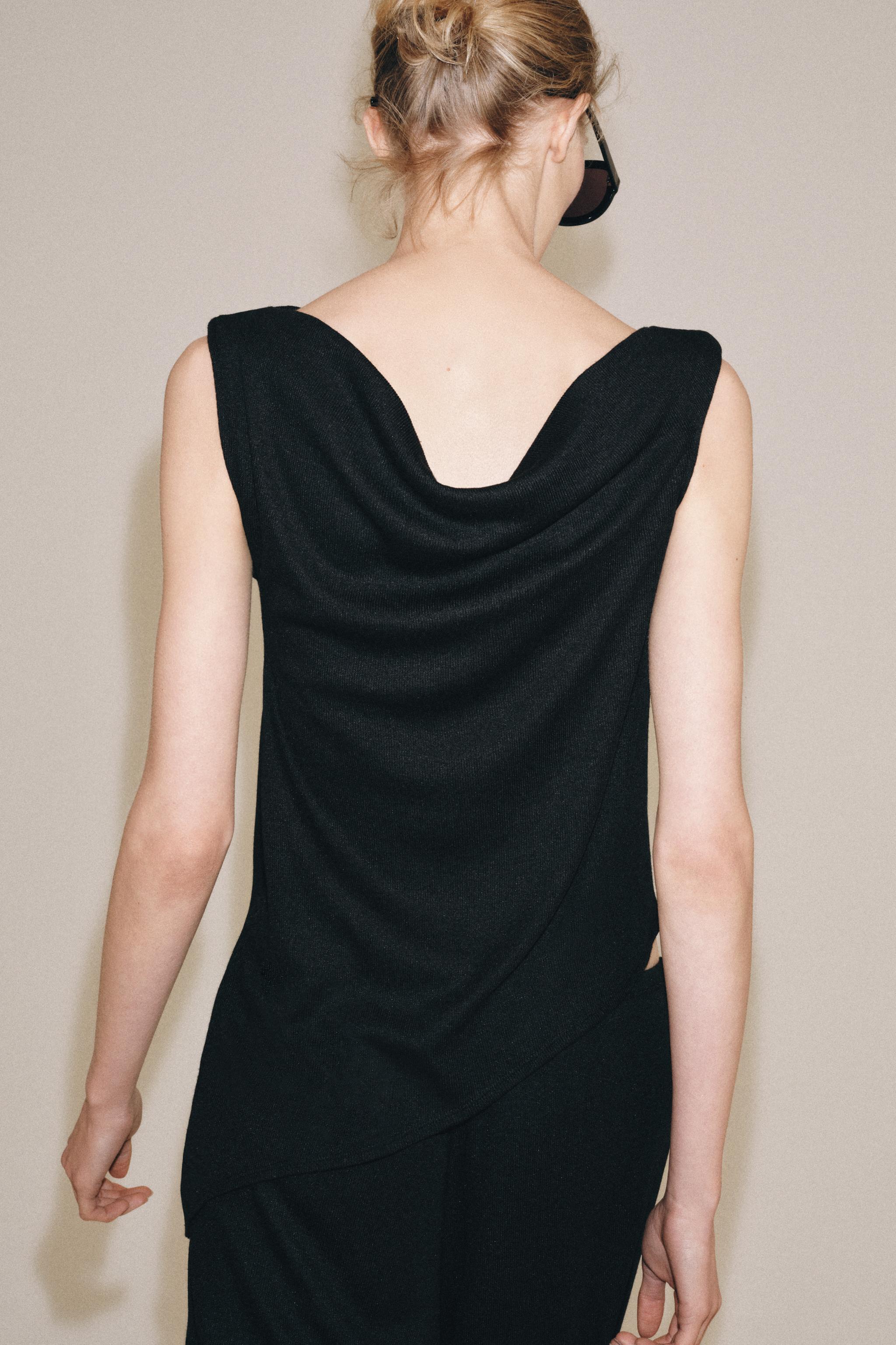 ASYMMETRIC RUSTIC TOP